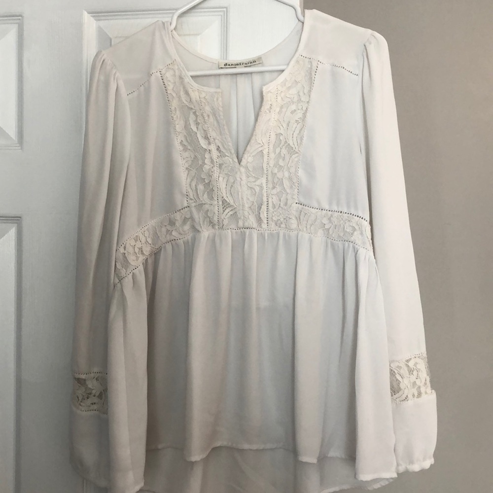 White blouse with lace neckline and sleeves